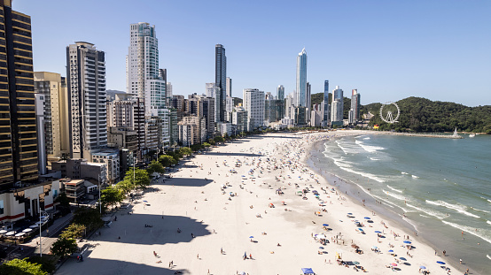 Aerial view of Balneário Camboriú beach - Santa Catarina, with expansion of the sand strip. Panoramic views of the beach with the new strip of sand, and the buildings still providing shade on the beach.